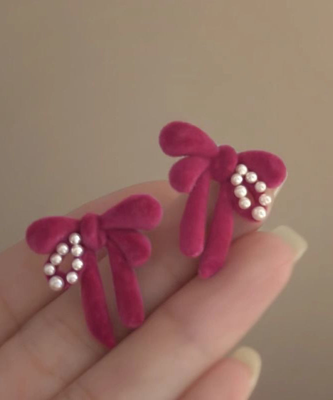 Raspberry Powder Sterling Silver Flocking Pearl Bow Stud Earrings