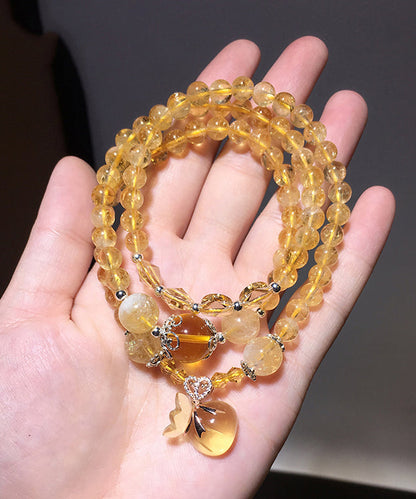Yellow Crystal Rosary Multi Loop Charm Bracelet