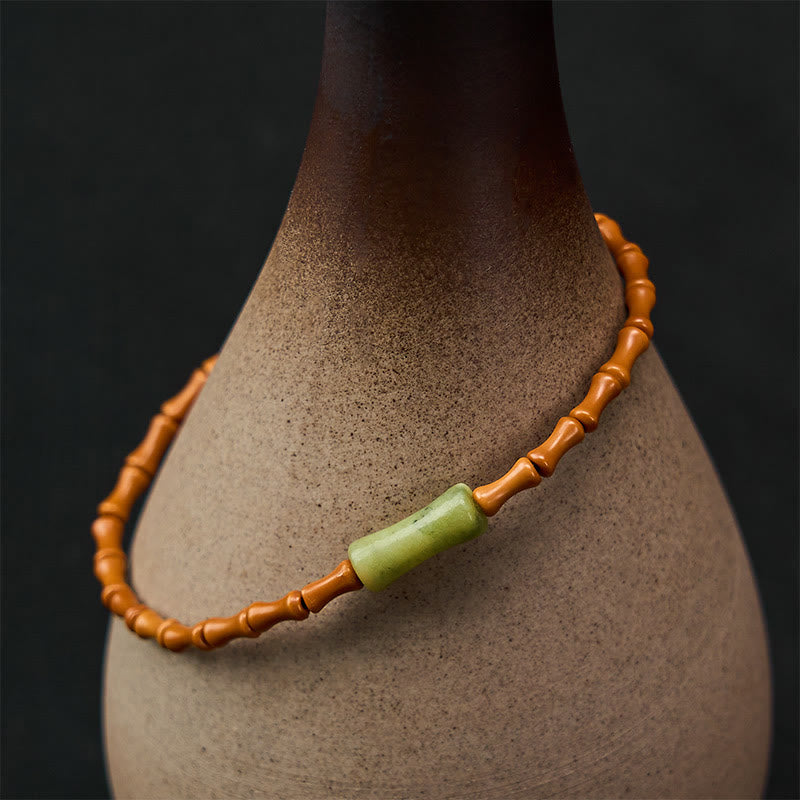 Buddha Stones Natural Olive Pit Peridot Bamboo Design Protection Bracelet