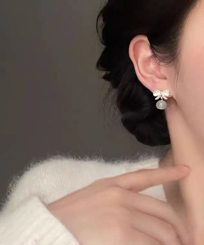 White Allloy Inlaid Pearl Cat's Eye Bow Drop Earrings