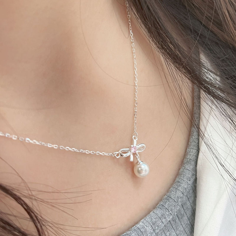Cady Bow and Pearl Necklace