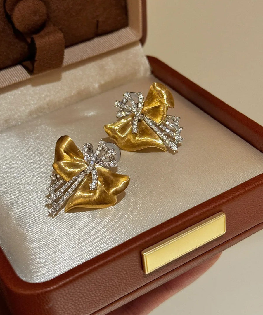 Gold Copper Zircon Asymmetrical Bow Stud Earrings