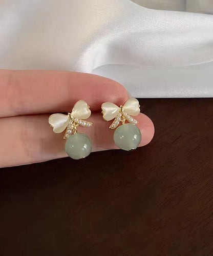 White Allloy Inlaid Pearl Cat's Eye Bow Drop Earrings