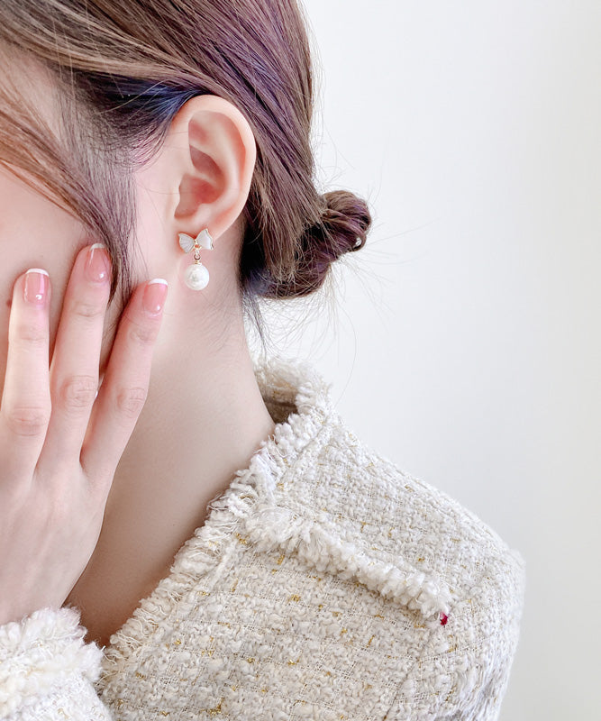 White Copper Alloy Bow Shell Pearl Drop Earrings