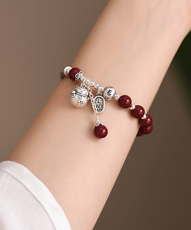 Mulberry Sterling Silver Cinnabar Tassel Charm Bracelet Kx1048