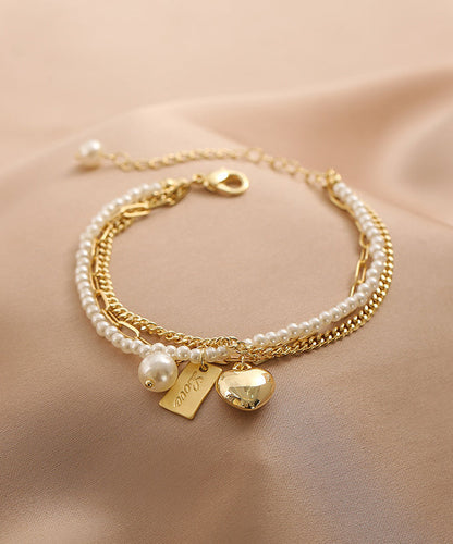 Vogue Gold Metal Alloy Pearl Graphic Love Tassel Charm Braceletfine Silk Sterling Silver Broken Silver Gypsophila Necklace Et008