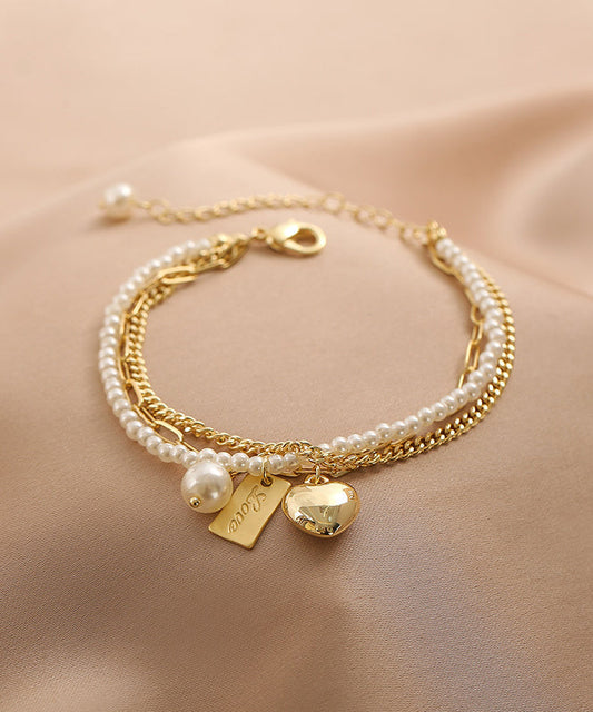 Vogue Gold Metal Alloy Pearl Graphic Love Tassel Charm Braceletfine Silk Sterling Silver Broken Silver Gypsophila Necklace Et008
