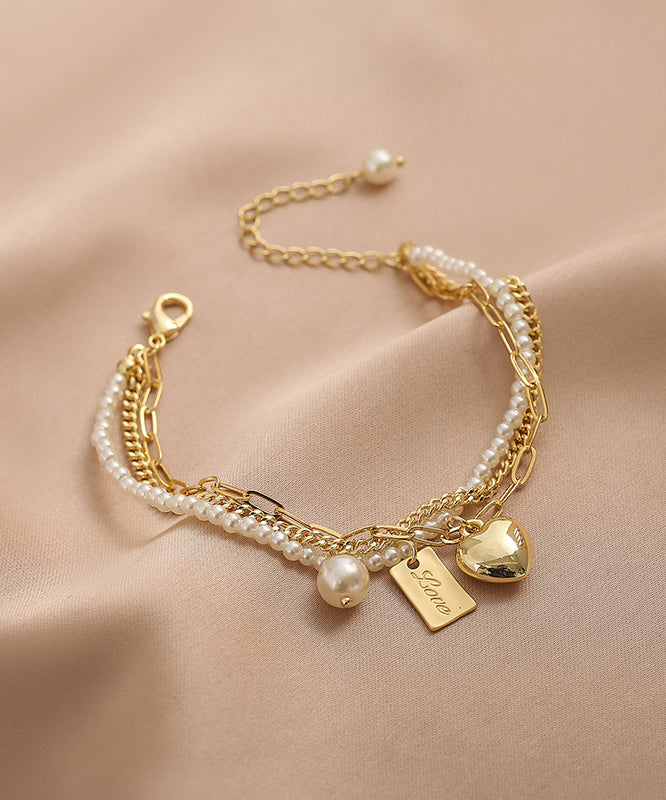 Vogue Gold Metal Alloy Pearl Graphic Love Tassel Charm Braceletfine Silk Sterling Silver Broken Silver Gypsophila Necklace Et008