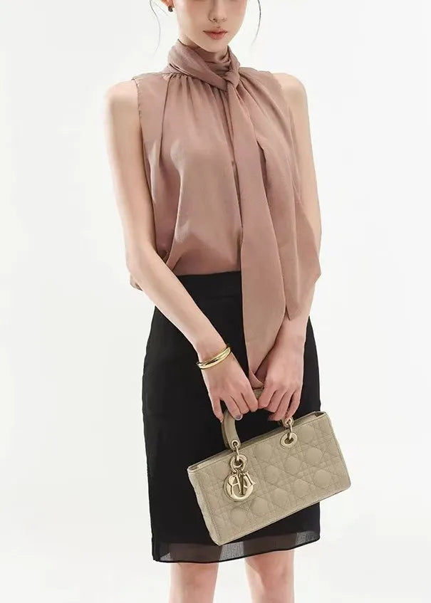 Loose Rubber Powder Bow Tops and Side Open Black Skirts Two Piece Set Sleeveless