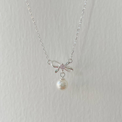 Cady Bow and Pearl Necklace