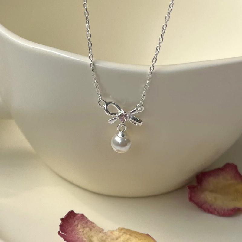 Cady Bow and Pearl Necklace