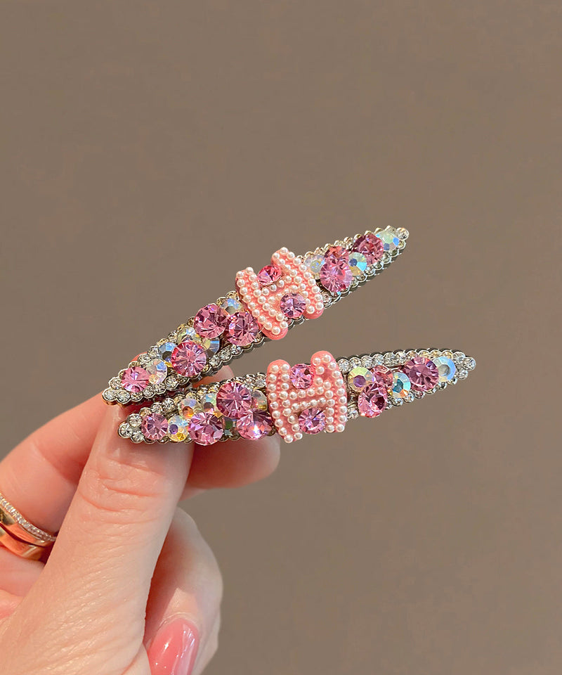 Pink Metal Zircon Pearl Graphic Hairpin