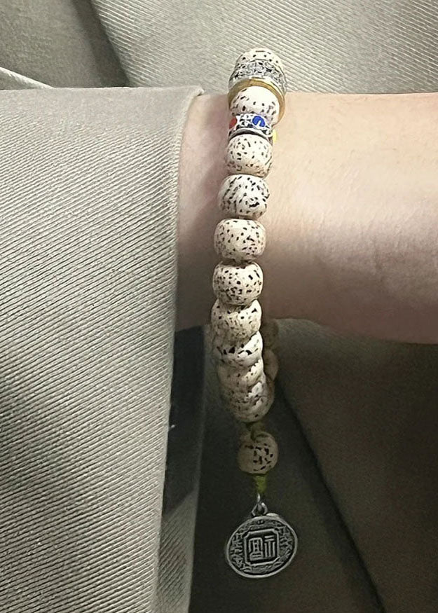 Pipal Tree Seed Fu Character Charm Bracelet