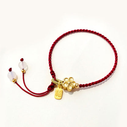 Red String Bracelet With Fu Character Charm and Peach Blossom Detail